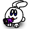 A small white bunny happily carries a Game Boy Color in their mouth.