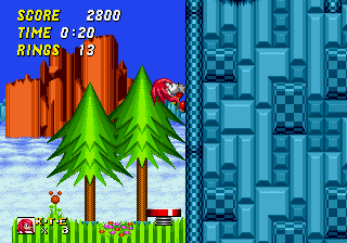 A screenshot of Sonic 2 with Knuckles, a ROM Hack of Sonic the Hedgehog 2 for the SEGA Mega Drive/Genesis. In this Screenshot, Knuckles is attached to a wall in Hill Top.